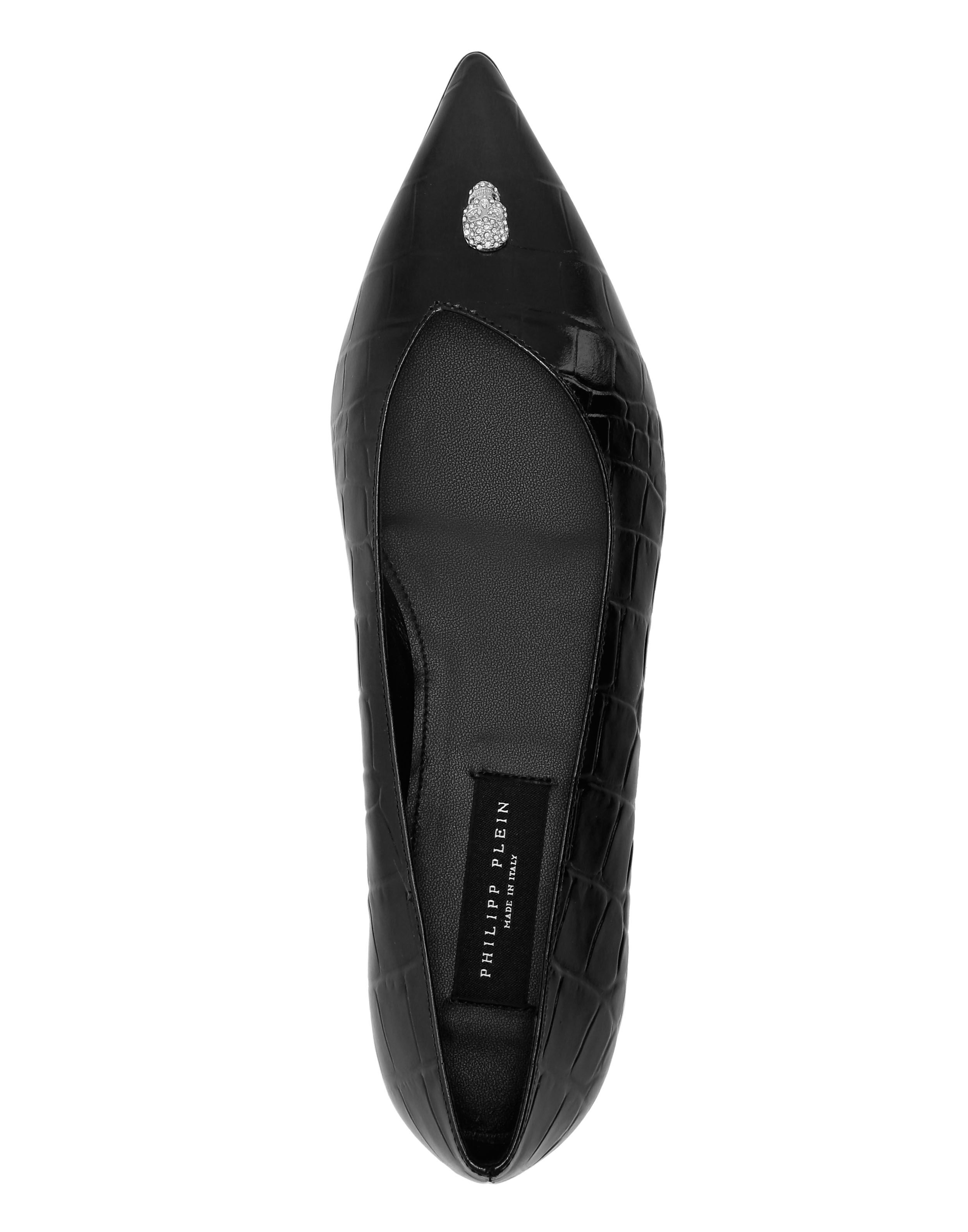 Mocassins asymétriques à tête de mort